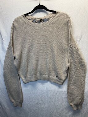 Hollister tan, natural fiber, crop sweater, with open back and tie. Size Med